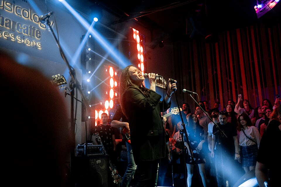 Archival singer performing at a live music venue